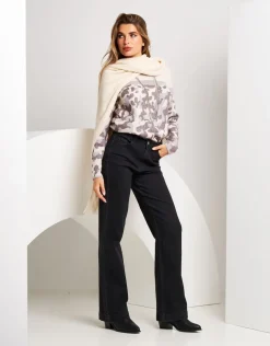 Mantella con paillettes e frange
