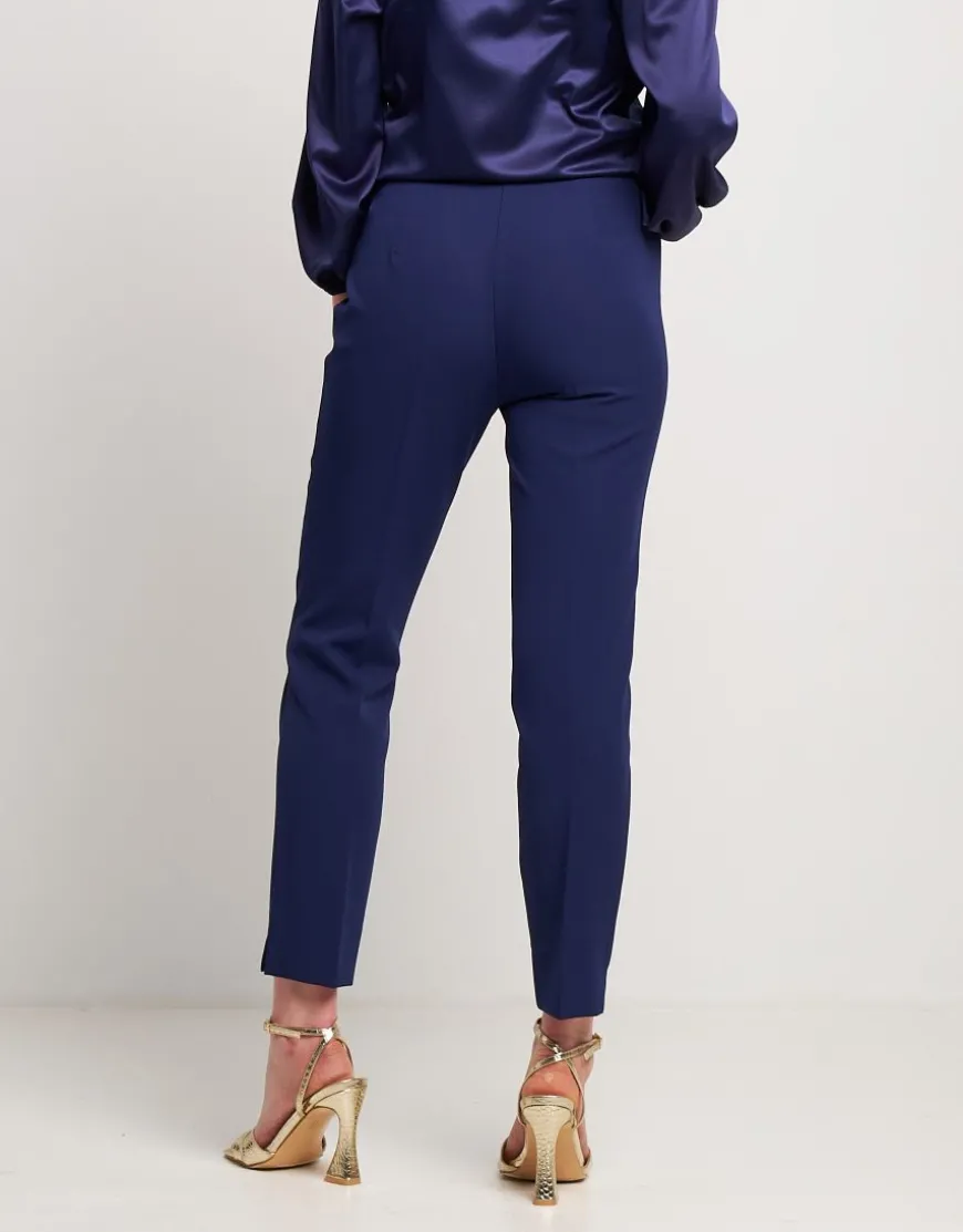 Pantalone classico con spacchetti