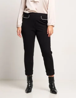 Pantalone con risvolto e pattine bordate