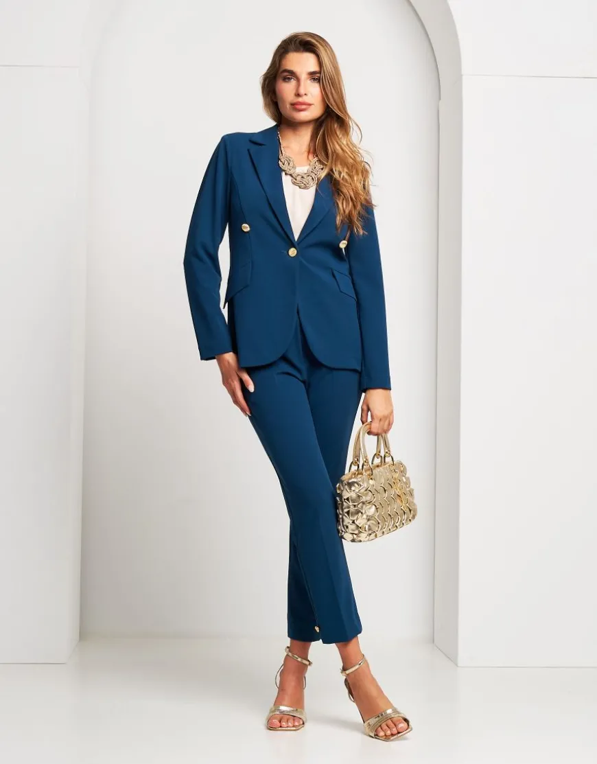 Pantalone con spacchi e bottoni sul fondo