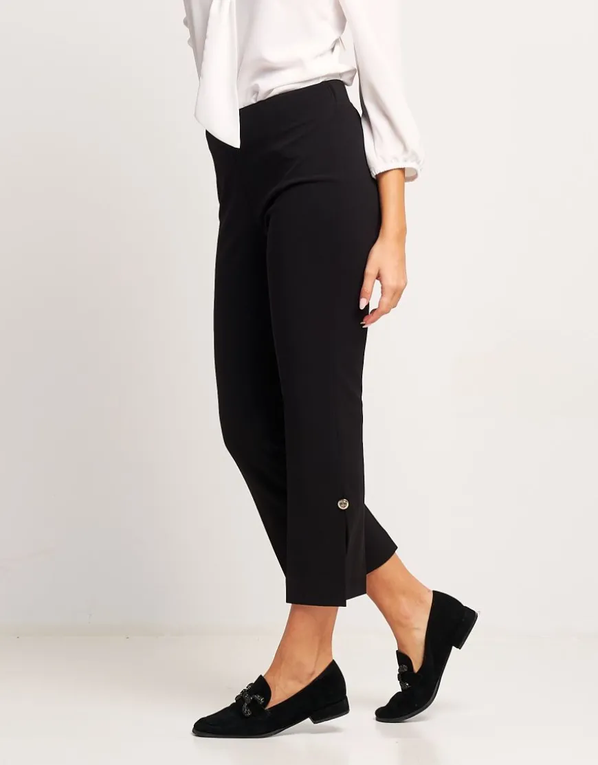 Pantalone con spacco e bottoncino