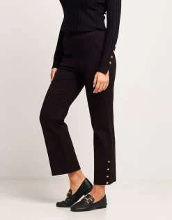 Pantalone cropped con bottoni oro