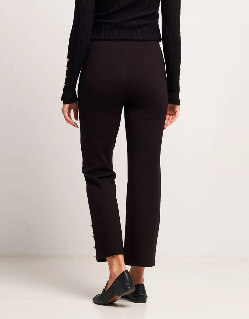 Pantalone cropped con bottoni oro