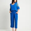 Pantalone cropped in viscosa con elastico e risvolti
