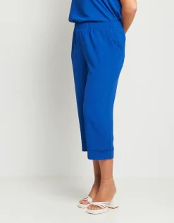 Pantalone cropped in viscosa con elastico e risvolti