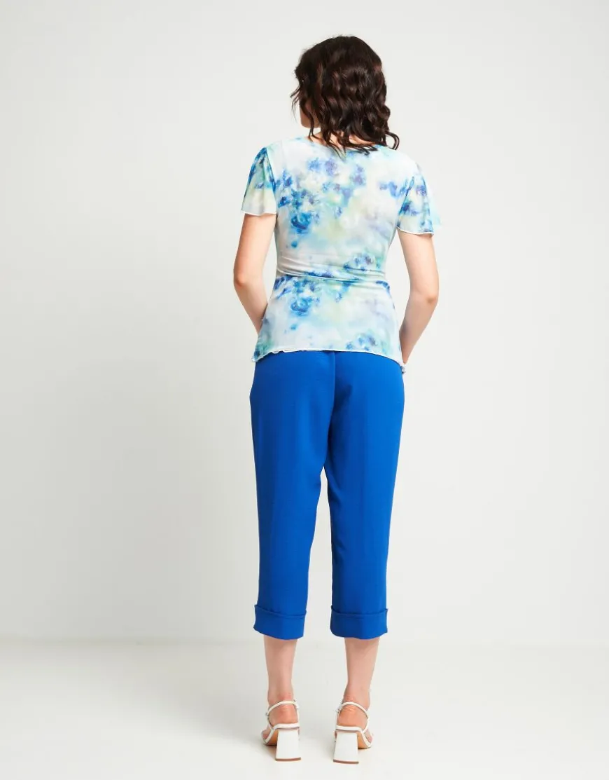 Pantalone cropped in viscosa con elastico e risvolti