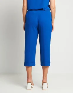 Pantalone cropped in viscosa con elastico e risvolti