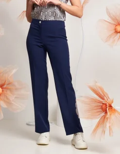 Pantalone dritto con bottone a contrasto