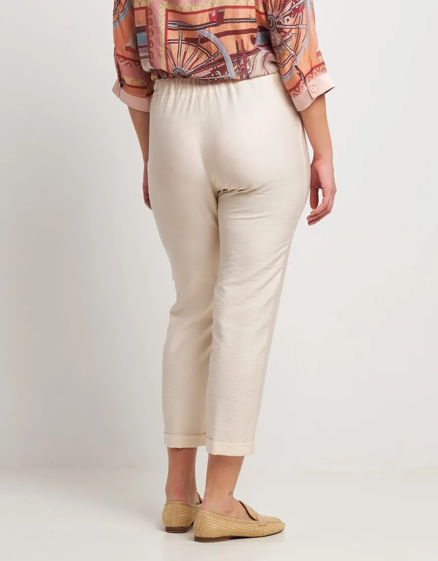 Pantalone effetto mosso con cinturino e risvolto