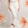 Pantalone in cotone con perle sui taschini