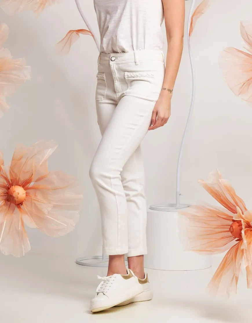 Pantalone in cotone con perle sui taschini
