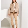 Pantalone in cotone con ricamo e tasche