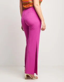 Pantalone in viscosa con spacchi sul fondo