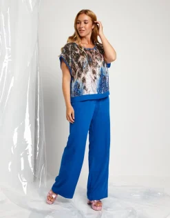 Pantalone largo in tessuto fluido con elastico e zip
