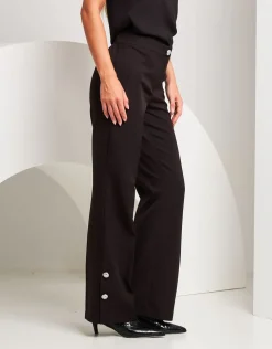 Pantalone palazzo con spacchi e bottoni