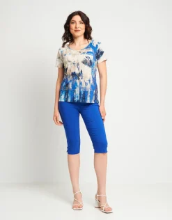 Pantalone pinocchietto con elastico e spacchetti