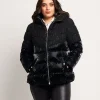 Piumino con inserti bouclé