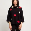 Ponchetta fantasia con collo alto