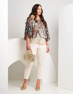 Poncho animalier con paillettes