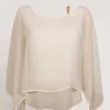 Poncho con accessorio e paillettes