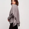 Poncho con bordure in velluto