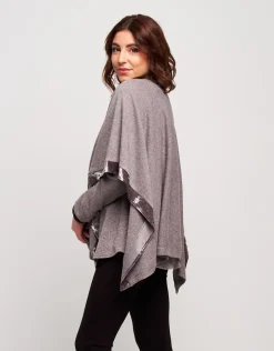 Poncho con bordure in velluto