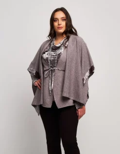 Poncho con bordure in velluto