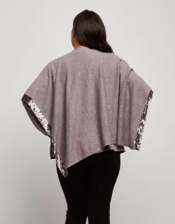 Poncho con bordure in velluto