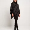 Poncho con disegno e frange