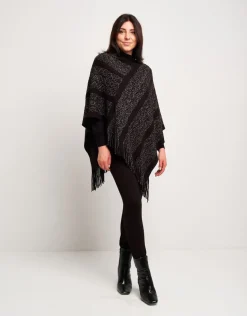 Poncho con disegno e frange