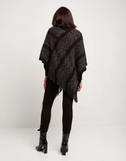 Poncho con disegno e frange