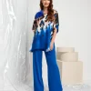Poncho con fronte fantasia animalier e spallina