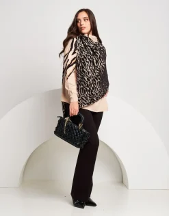 Poncho con pattern animalier