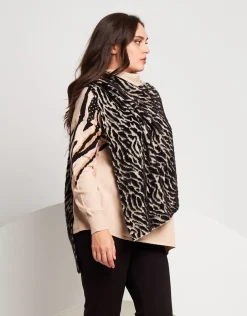 Poncho con pattern animalier