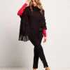 Poncho con perle e frange