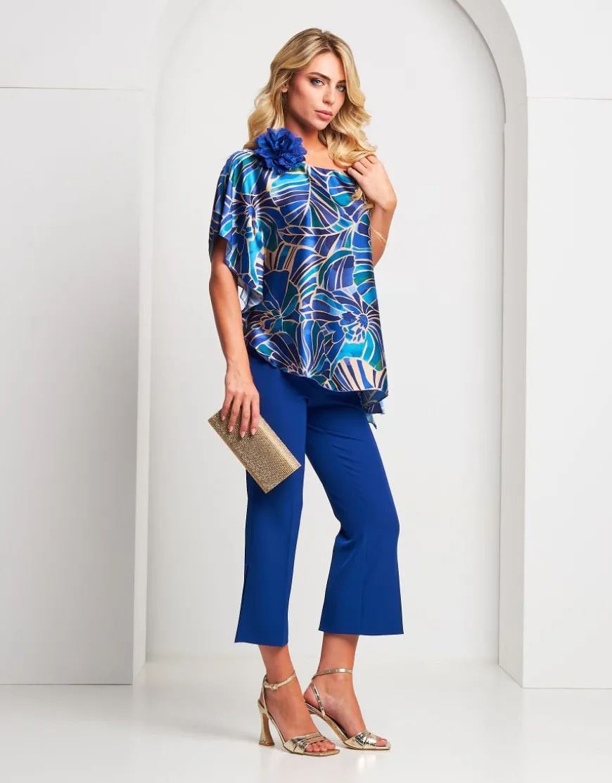 Poncho fantasia con spallina oro