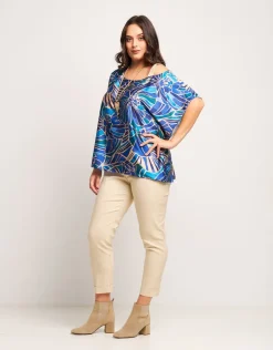 Poncho fantasia con spallina oro