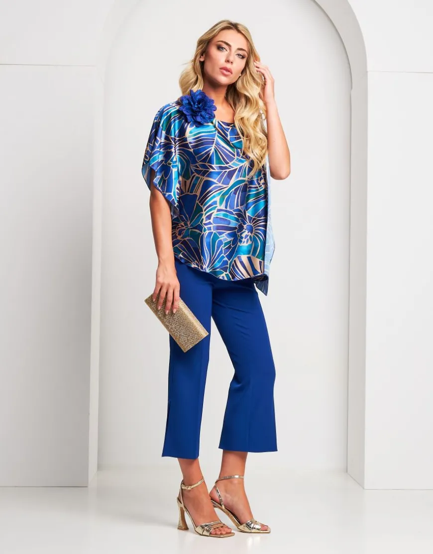 Poncho fantasia con spallina oro