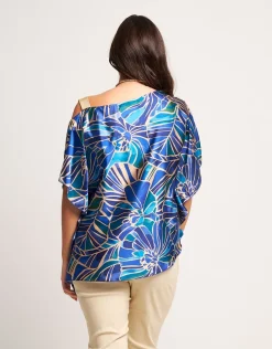 Poncho fantasia con spallina oro