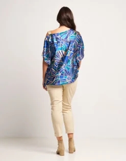 Poncho fantasia con spallina oro