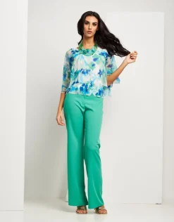 Poncho fantasia menta con paillettes