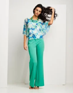 Poncho fantasia menta con paillettes