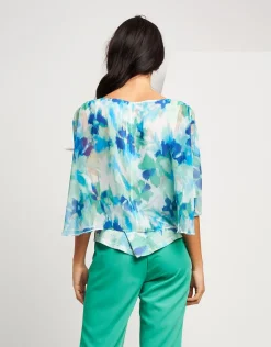 Poncho fantasia menta con paillettes