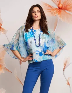 Poncho floreale in georgette con paillettes