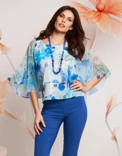 Poncho floreale in georgette con paillettes