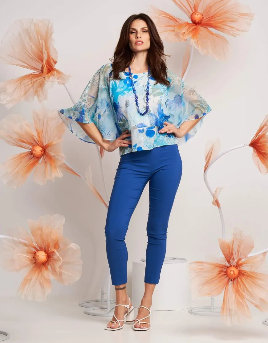 Poncho floreale in georgette con paillettes