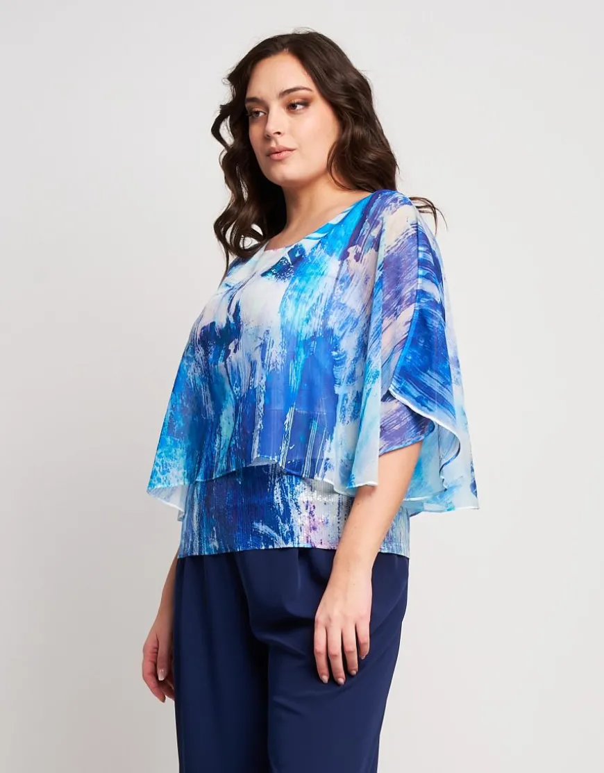 Poncho in georgette con fondo di paillettes