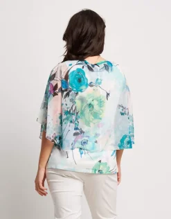 Poncho in georgette con top e paillettes