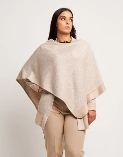 Poncho in maglia con riporti
