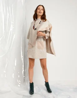 Poncho in maglia con riporti